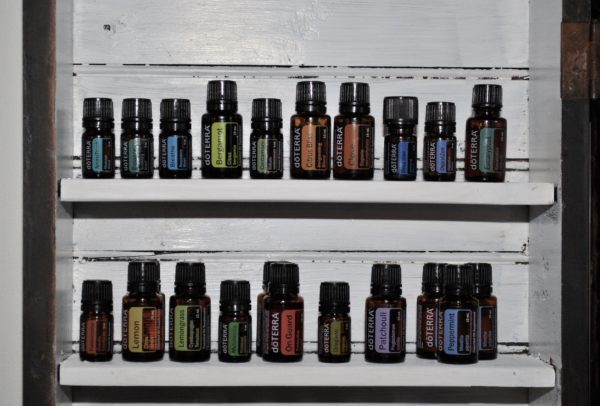 Repurposed Piano Bench Turned Essential Oil Cabinet - doterra